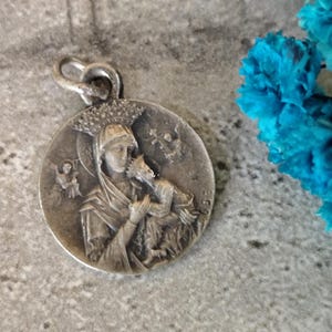 Rare religious medal of Our Lady of Perpetual Help and Saint Gerarde Maiella in silver color