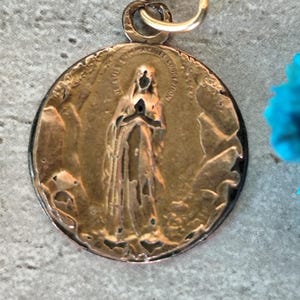 Virgin mary and child medal