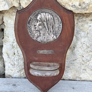 Our lady lourdes holy water font