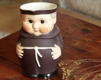 vintage priest pitcher