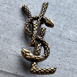 希少なイヴ・サンローランの蛇のブローチ - Etsy 日本