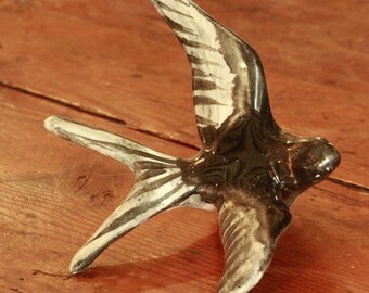 black and white ceramic swallow