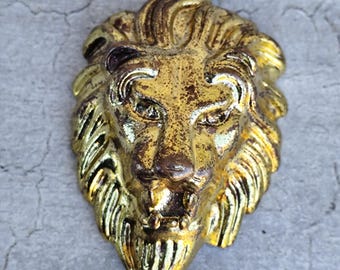 Colgante de cabeza de león