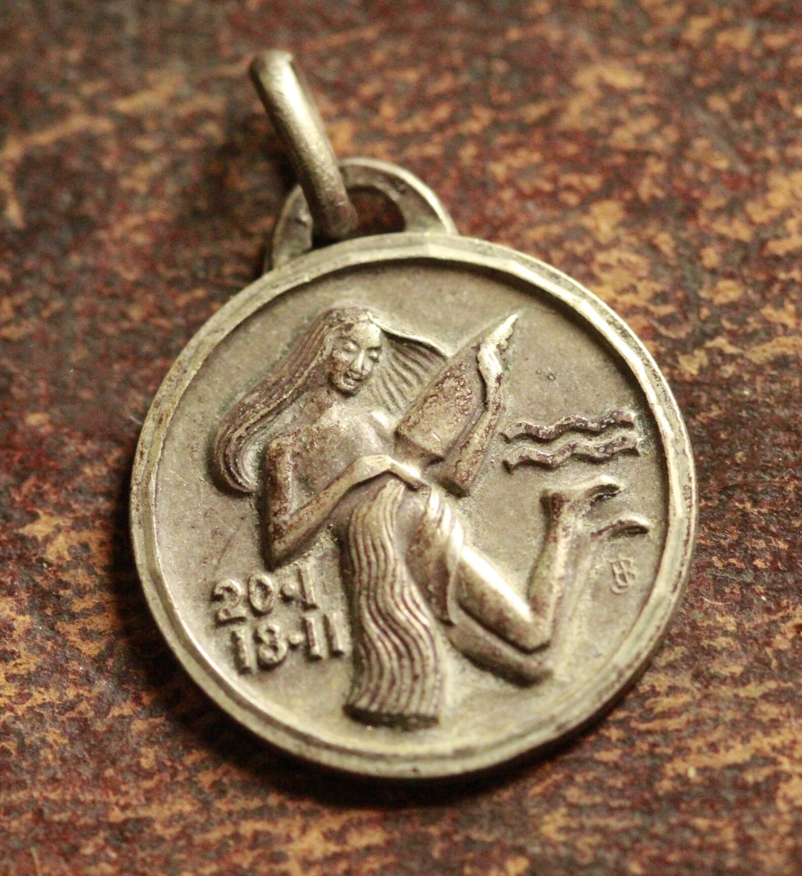 ancient aquarius pendant