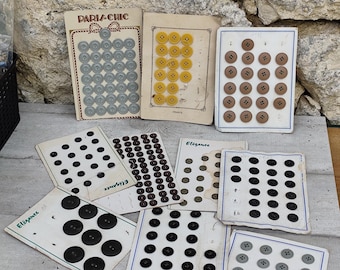 Lot of antique buttons on plates