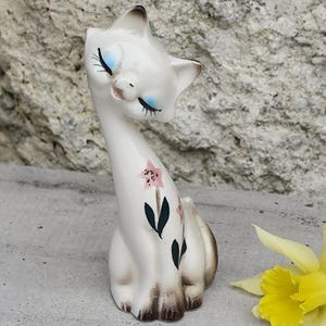 rare dog ceramic statue