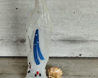 Plastic bottle in the shape of the Virgin Mary with holy water, Lourdes pilgrimage souvenir, home protection
