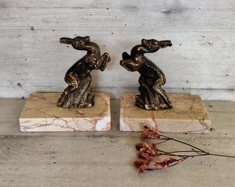 Antik art déco-bokstöd i marmor