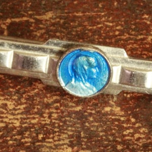 enamel religious brooch