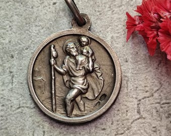 Antique religious medal of Saint Christopher, patron saint of travelers, and of Pope John XXIII, in silver