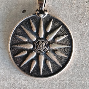 antique silver flower pendant