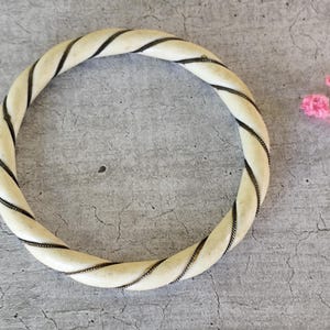 Twisted bangle bracelet