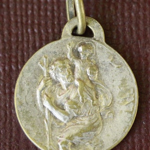 rare saint christopher medal and our lady lachet medal