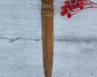 wooden tiki paper cutter