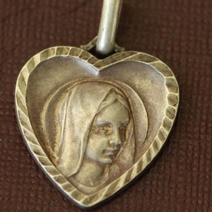 Vintage heart lourdes medal