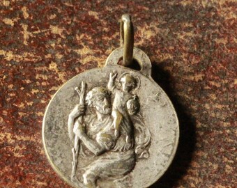 rare saint christopher medal and our lady lachet medal