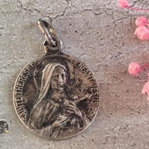 Rare Jésus Christ and teresa silver medal