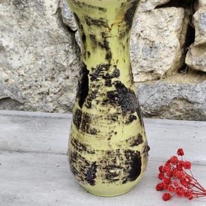 yellow and black vintage ceramic vase