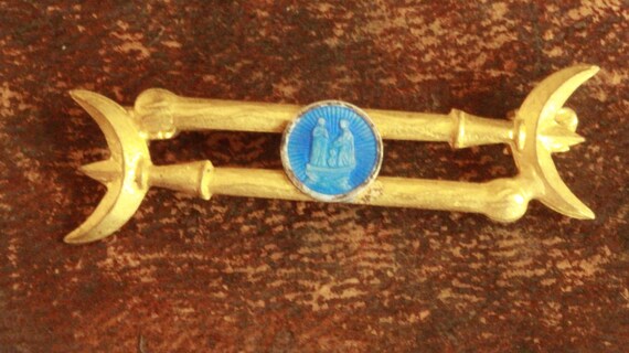 Religious pins and best sale brooches