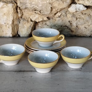 lot of old cups and saucers