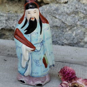 porcelain chinese god statue