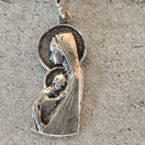 Virgin mary and child medal