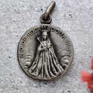 Antique religious medal of Our Lady of Rocamadour and Jesus Christ