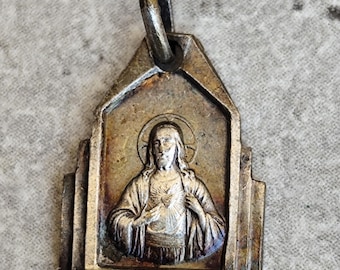 Rare ancienne médaille religieuse notre dame du bon secours et Jésus Christ de couleur argentée ronde