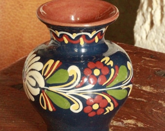 small ceramic vase