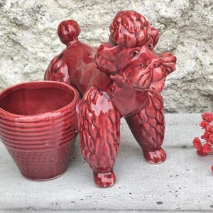 old empty ceramic poodle pocket