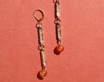 Saturn Single Drop Earrings With Carnelian Orb