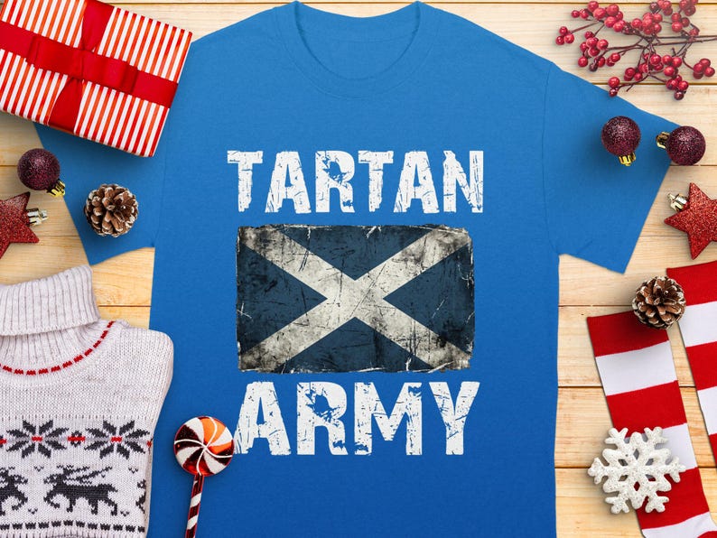 Blue t-shirt with white "TARTAN ARMY" text and a distressed Scottish flag graphic.