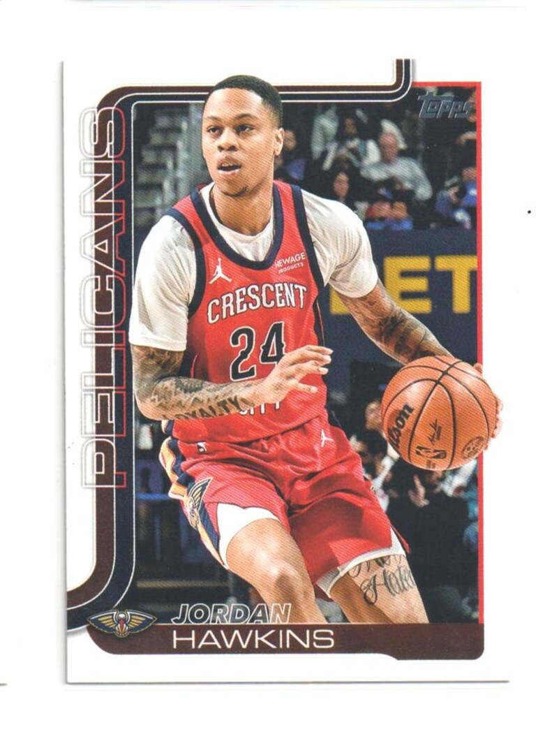May include: A basketball trading card featuring Jordan Hawkins of the New Orleans Pelicans. Hawkins is wearing a red jersey with the number 24 and the word "CRESCENT" on the front. The card has a white border and the Topps logo.