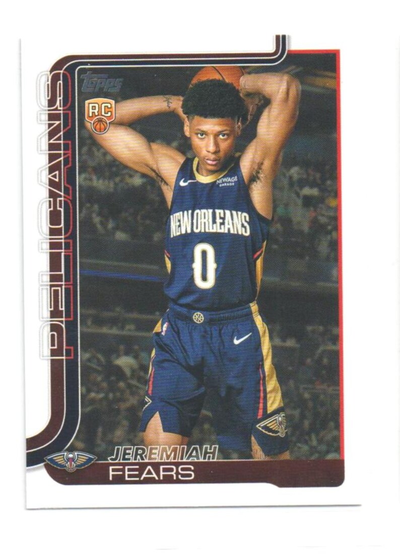 May include: A New Orleans Pelicans basketball trading card featuring Jeremiah Fears. The card has a dark blue and gold color scheme, with the player in his team uniform. The card includes the team logo and player's name.