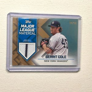 Baseball Karte – Gerrit Cole #MLM-GC - New York Yankees - 2022 Topps Jersey Patch 4/50 - Magnethülle inklusive!