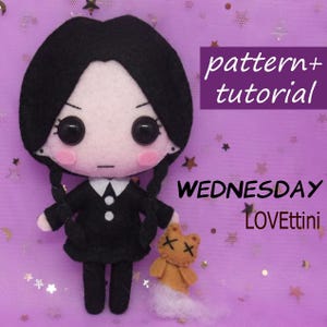 May include: A handmade felt doll of Wednesday Addams in a black dress with pigtails, a small stuffed cat, and the text "pattern+tutorial" and "WEDNESDAY LoveTtini" on a purple background.