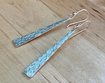 Beautifully simple, hammered sterling silver drop earrings, classic geometric long triangular shape