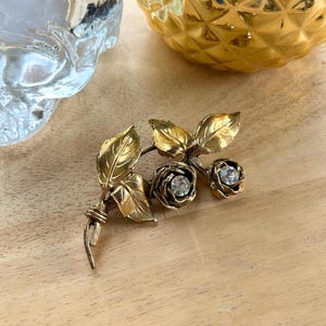POGGI PARIS ブローチ リボン型 ゴールドカラー アクセサリー