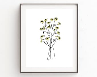 May include: A framed wall art print featuring a black line drawing of a wildflower bouquet with pale yellow petals and dark centers. The artwork is centered on a white background and enclosed in a thin, dark brown rectangular frame.