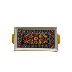 May include: Rectangular ceramic serving tray with a vibrant floral design. The tray features a white base with a colorful central pattern of red, blue, and yellow flowers and decorative elements. The edges and handles are yellow.