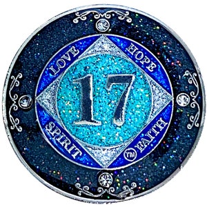 NA 17 Year Glitter & Crystals Medallion, Silver Color Plated Coin, Black Rainbow, Blue Glitter and Four Clear Crystals, Epoxy Covered
