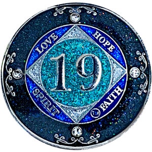 NA 19 Year Glitter & Crystals Medallion, Silver Color Plated Coin, Black Rainbow, Blue Glitter and Four Clear Crystals, Epoxy Covered