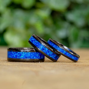 Deep Blue Bello Opal and Black Ceramic Ring – Bold and Serene Design