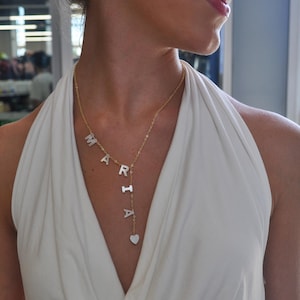 Collar con nombre y lazo personalizado