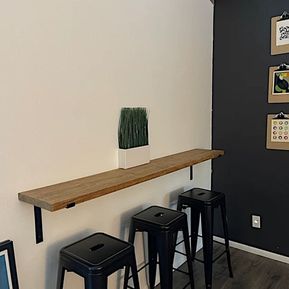 Floating loft bar table deals