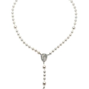 White pearl prayer beads on white background. Pearls are spaced by silver lined clear seed beads. It has a sterling silver Virgin Mary Rosary Center charm and Sterling Silver Crucifix pendant.