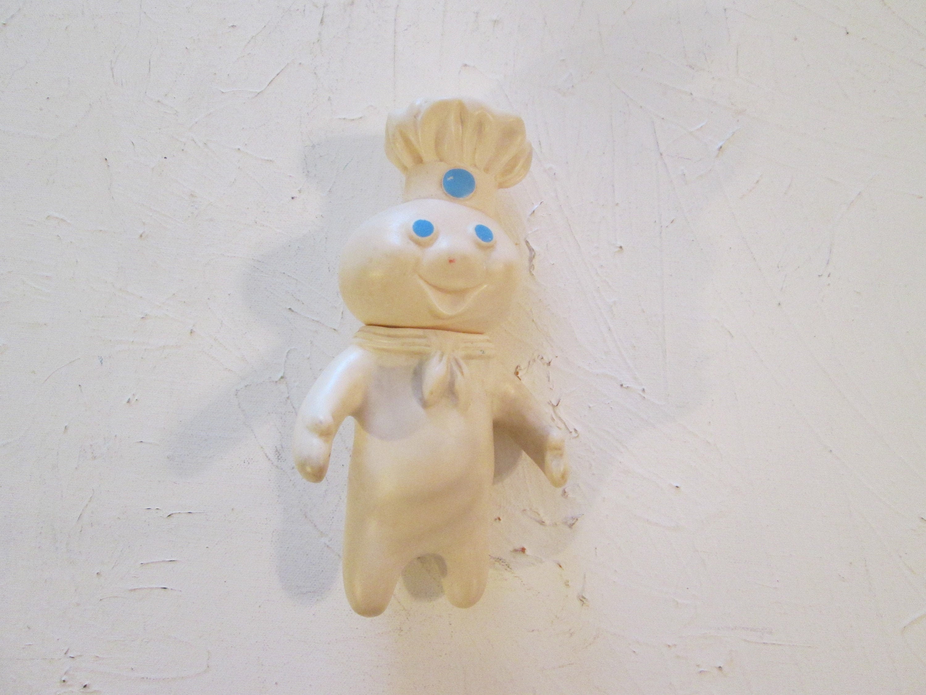 Rubber pillsbury doughboy doll hotsell