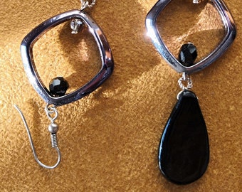 Boucles longues noires asymétriques