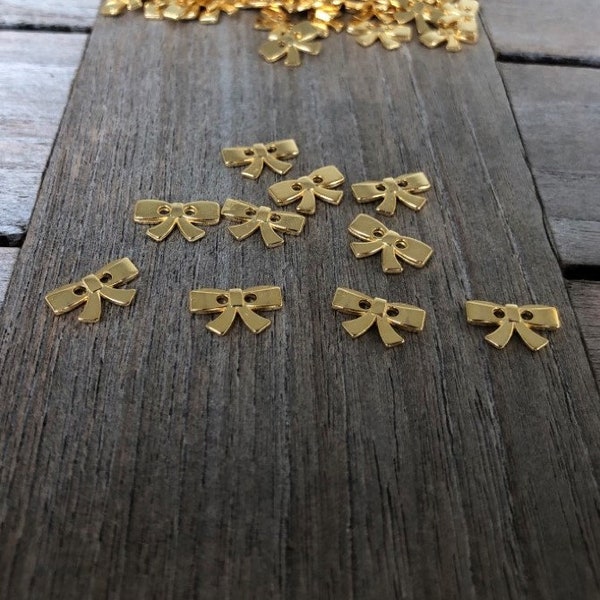 10 Stück Mini Metallknöpfe gold glänzend Schleife 2 Loch