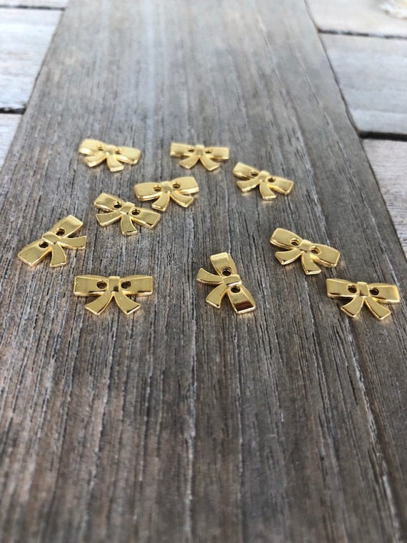 10 Stück Mini Metallknöpfe gold glänzend Schleife 2 Loch
